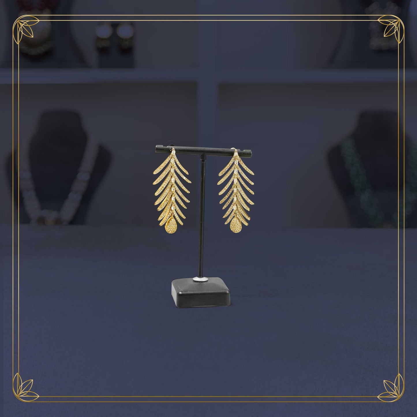 The Gilded Palm Frond Earrings