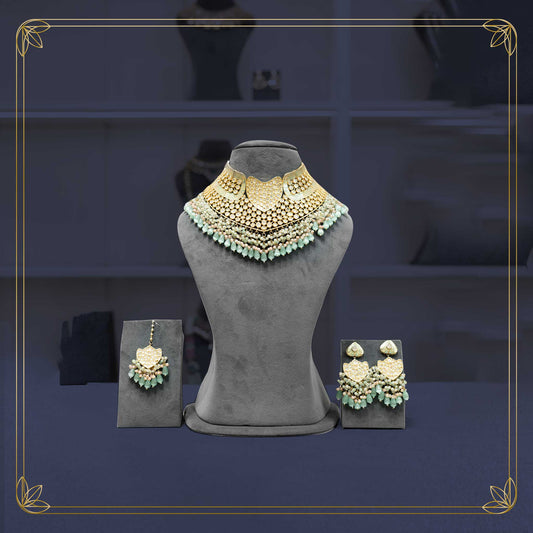 Dazzling Kundan Bridal Set with a Touch of Mink Pink - Rental
