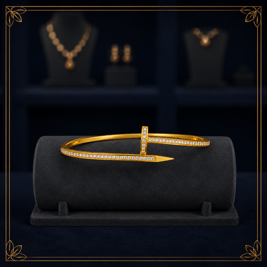 The Signature Nail Bangle (Gold Finish)