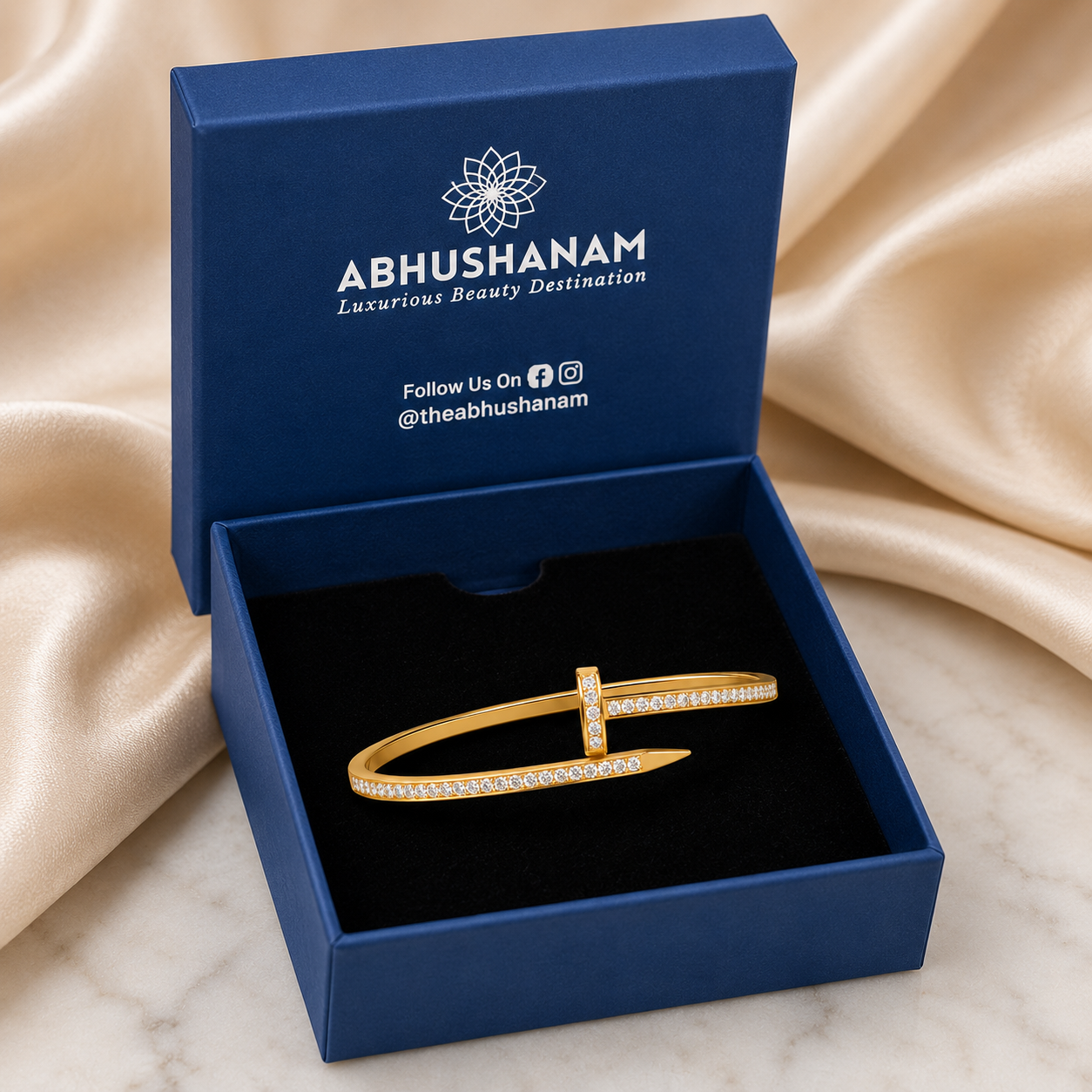 The Signature Nail Bangle (Gold Finish)