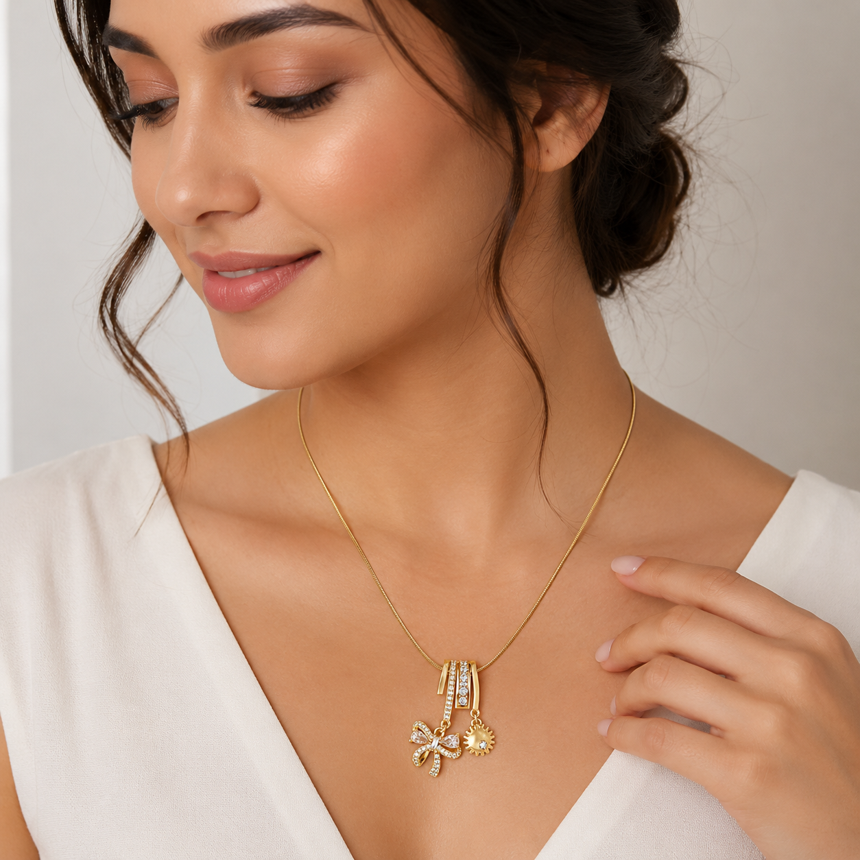Sun & Bow Charm Pendant (51863)